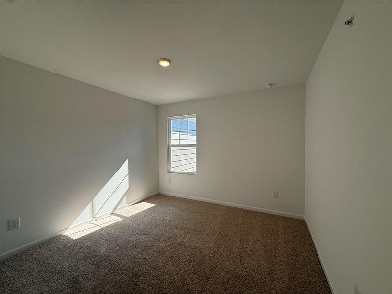 Spacious, unfurnished interior of a new home in Laurelwood, Douglasville (Image 43).