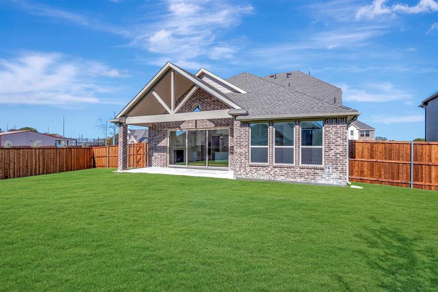 Exterior details and patio area of a home in Kreymer at the Park, Wylie (Image 25). Exterior details and patio area of a home in Kreymer at the Park, Wylie (Image 25).