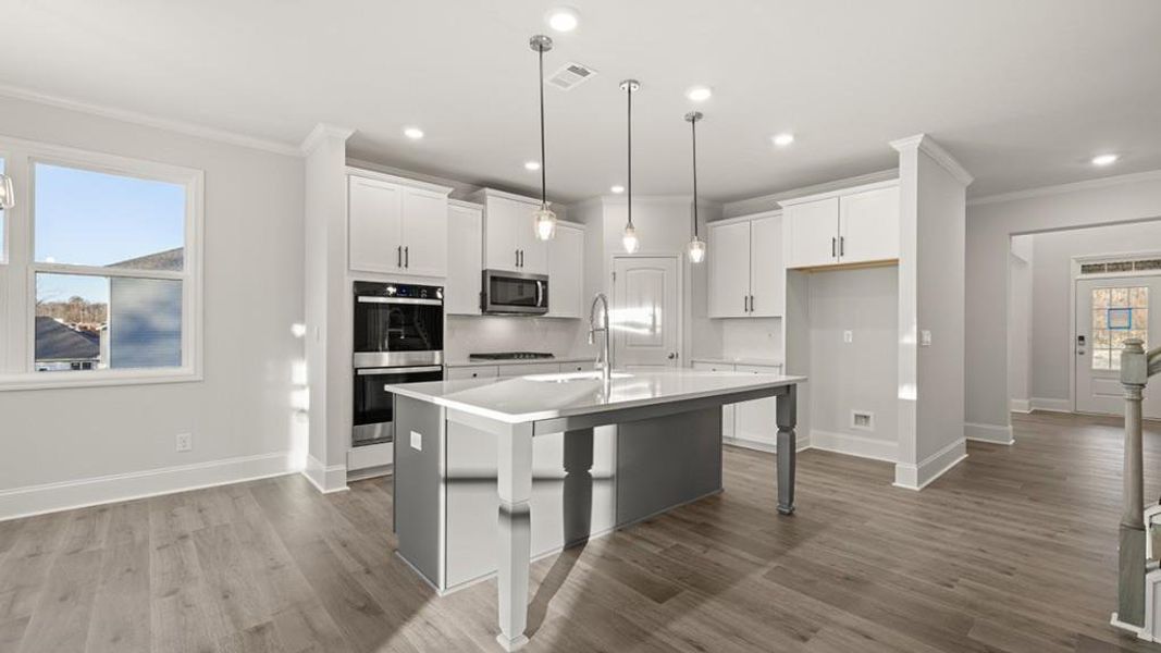 Furnished interior view inside a new home in Butner Estates, South Fulton (Image 7).