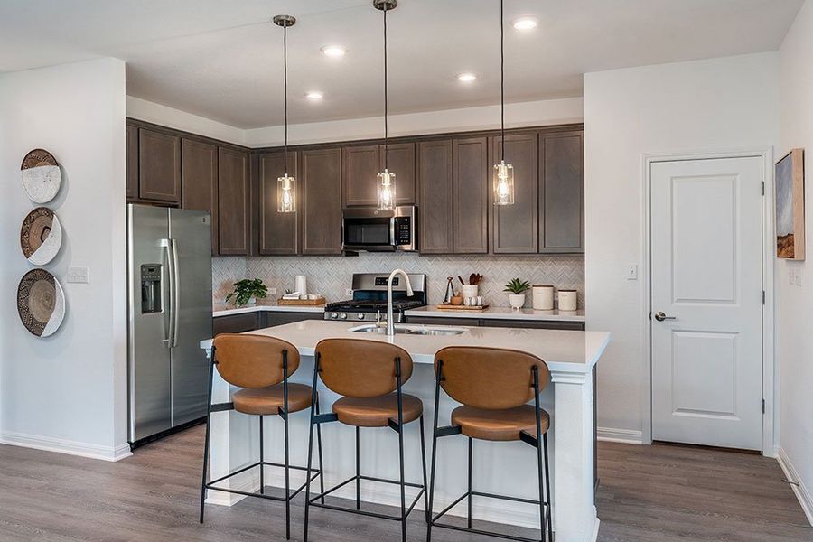 Representative furnished interior of a home built from the Jasmine by Taylor Morrison in Turner's Crossing 45s, Buda (Image 12).