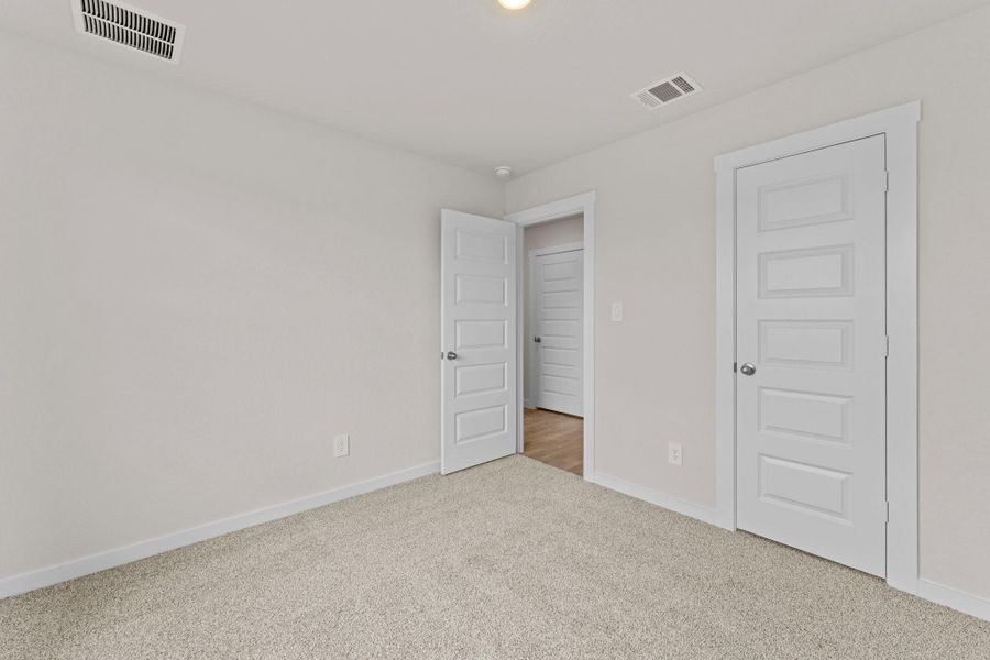 Spacious, unfurnished interior of a new home in Hartland Ranch, Lockhart (Image 21).