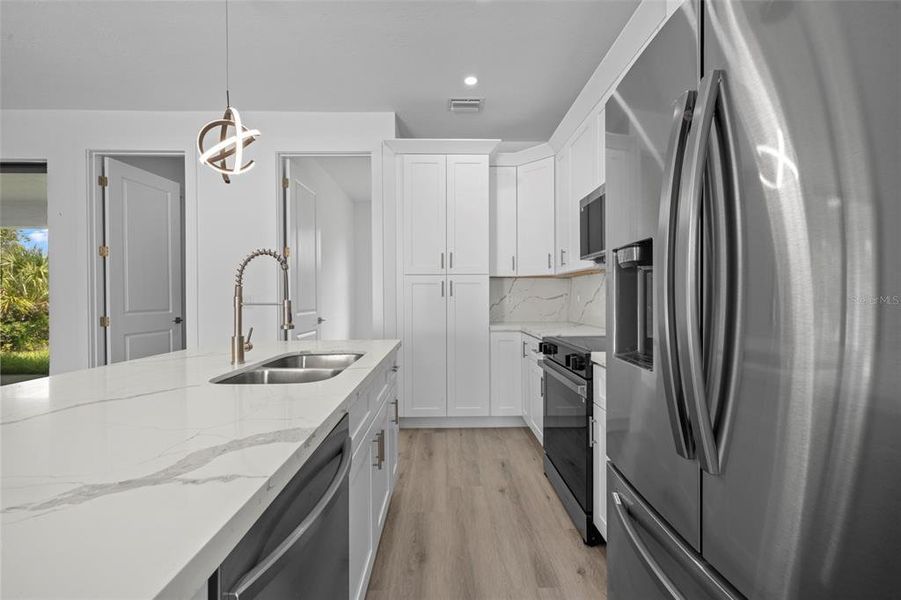 Furnished interior view inside a new home in , Port Charlotte (Image 5).