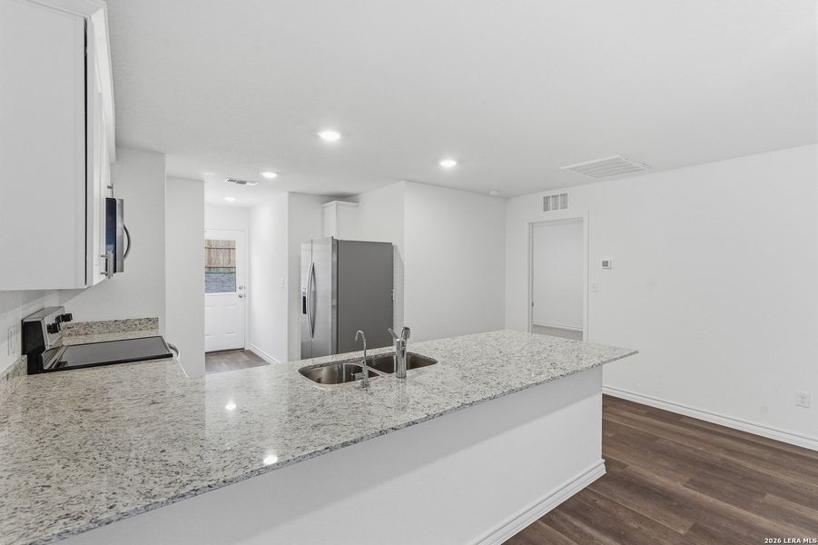 Furnished interior view inside a new home in Vista Real, Converse (Image 13).