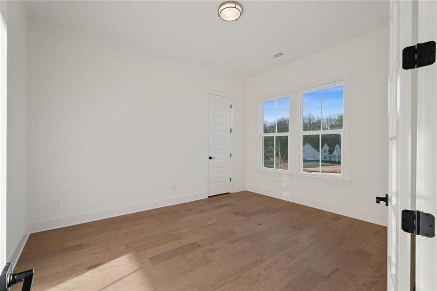 Spacious, unfurnished interior of a new home in Long Hollow Landing, Gainesville (Image 41).