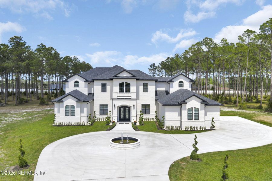 Front exterior of a new home in , Jacksonville, FL, highlighting curb appeal (Image 25).