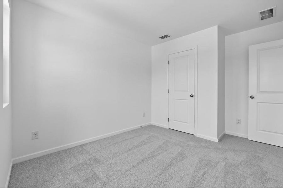 Spacious, unfurnished interior of a new home in Weatherfield, Buford (Image 33).