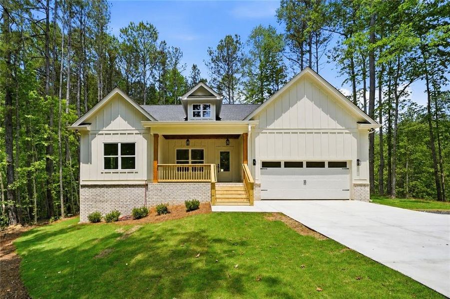 Front exterior of a new home in Autumn Brook, Canton, GA, highlighting curb appeal (Image 1). Front exterior of a new home in Autumn Brook, Canton, GA, highlighting curb appeal (Image 1).