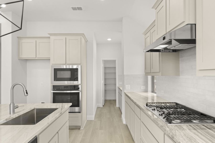 Furnished interior view inside a new home in Sutton Fields, Celina (Image 6).