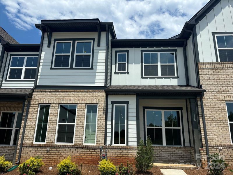 Exterior Photo 7.31 Fiber Cement Siding Beautiful Streetscape - Home across from planned amenity