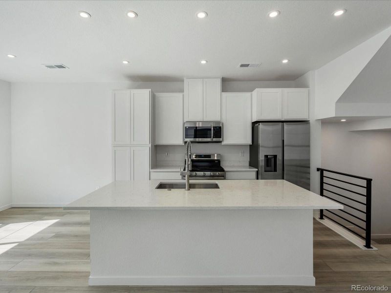 Furnished interior view inside a new home in The Hub at Virginia Village, Denver (Image 7). Furnished interior view inside a new home in The Hub at Virginia Village, Denver (Image 7).