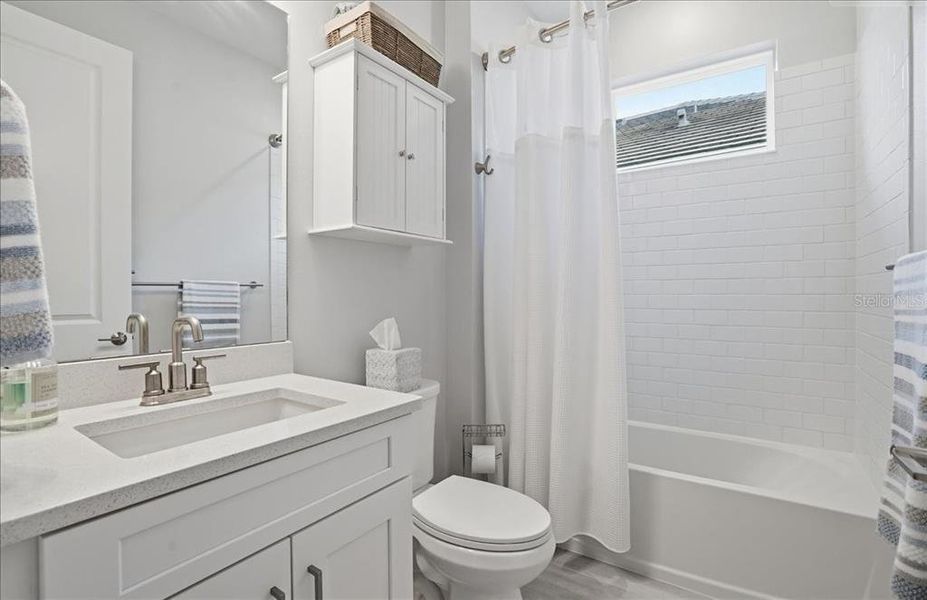 Furnished interior view inside a new home in Esplanade at Artisan Lakes, Palmetto (Image 31).