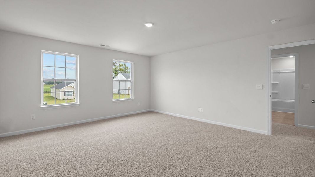 Spacious, unfurnished interior of a new home in Ridgewood Farms, Winterville (Image 17).
