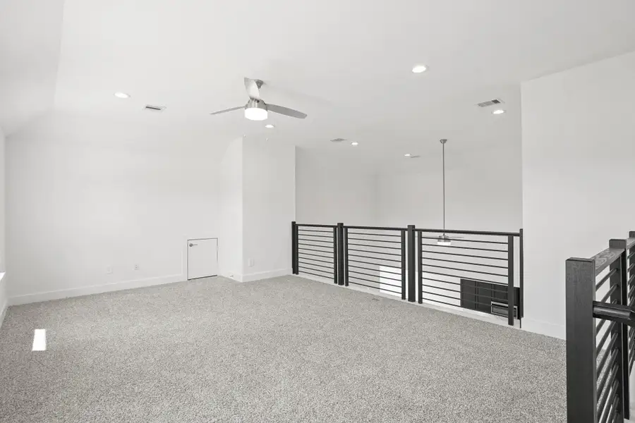 Spacious, unfurnished interior of a new home in Hills of Westlake, Conroe (Image 10).