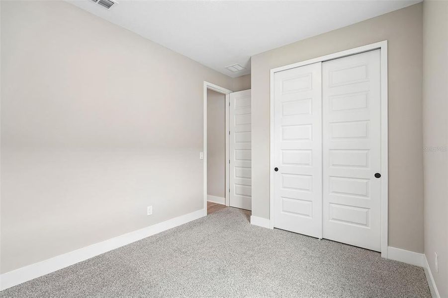 Spacious, unfurnished interior of a new home in Legends Preserve - Signature Series, Daytona Beach (Image 33).