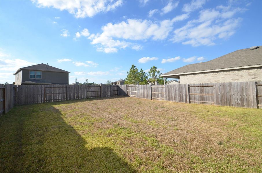 Exterior details and patio area of a home in Mavera, Conroe (Image 2). Exterior details and patio area of a home in Mavera, Conroe (Image 2).