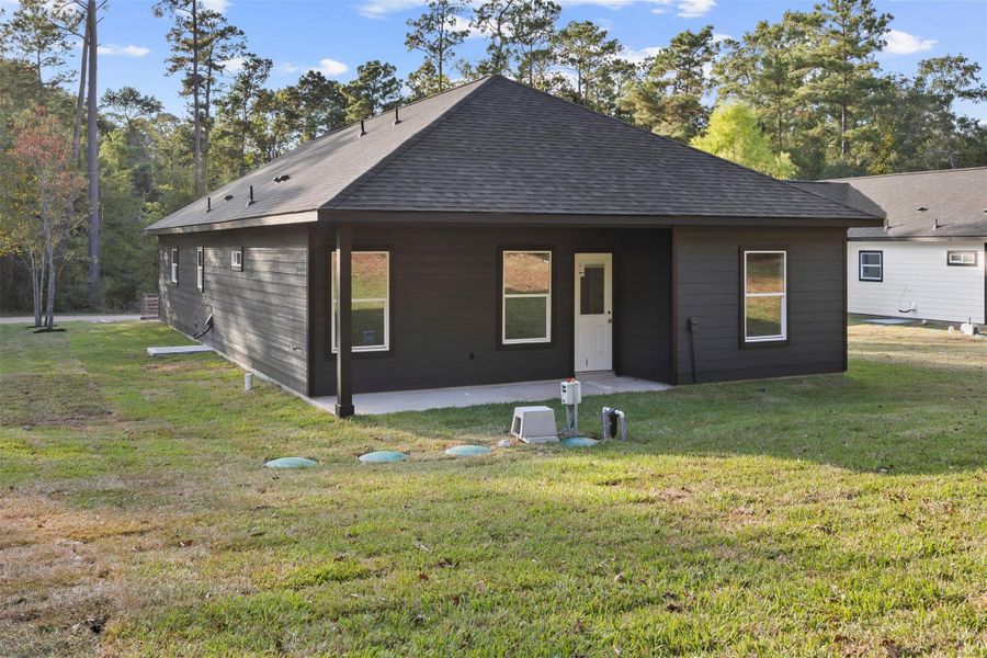 Exterior details and patio area of a home in , Willis (Image 3). Exterior details and patio area of a home in , Willis (Image 3).