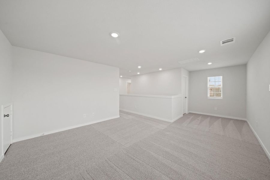 Spacious, unfurnished interior of a new home in Lonestar Collection at Paloma at Sanford Farms, Waller (Image 17).