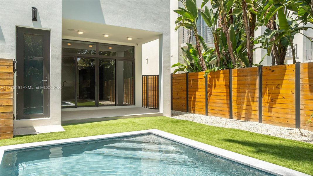 Front exterior of a new home in , Miami, FL, highlighting curb appeal (Image 28).