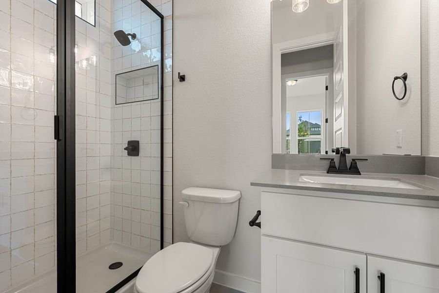 Furnished interior view inside a new home in Heritage, Dripping Springs (Image 18).