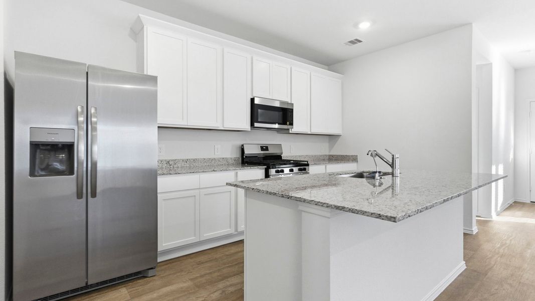 Furnished interior view inside a new home in Tamarron, Fulshear (Image 5).