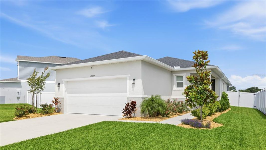 Front exterior of a new home in , Parrish, FL, highlighting curb appeal (Image 20).