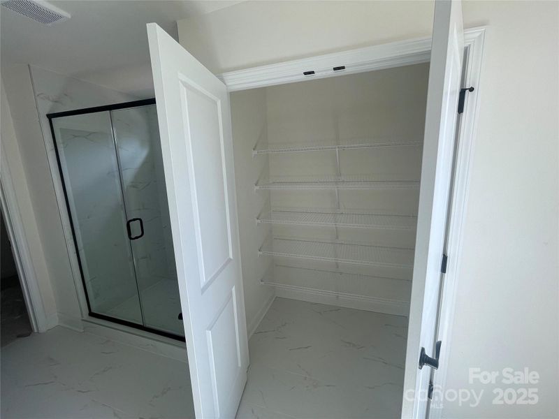 Linen Closet in Primary Linen Closet in Primary