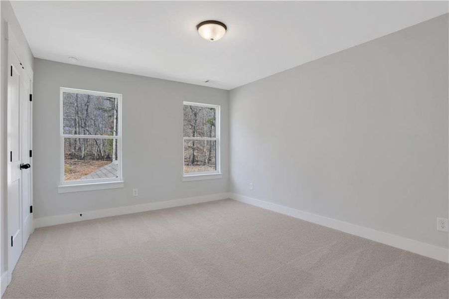 Spacious, unfurnished interior of a new home in Cambridge, Flowery Branch (Image 27).