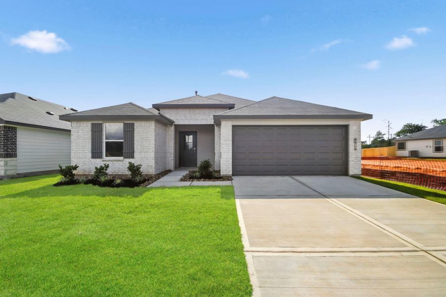 Front exterior of a new home in Chapel Lakes, Montgomery, TX, highlighting curb appeal (Image 2). Front exterior of a new home in Chapel Lakes, Montgomery, TX, highlighting curb appeal (Image 2).