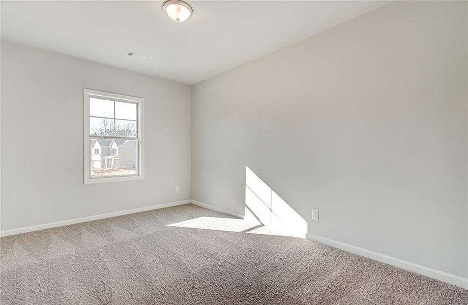 Spacious, unfurnished interior of a new home in Enclave at Logan Point, Loganville (Image 15).