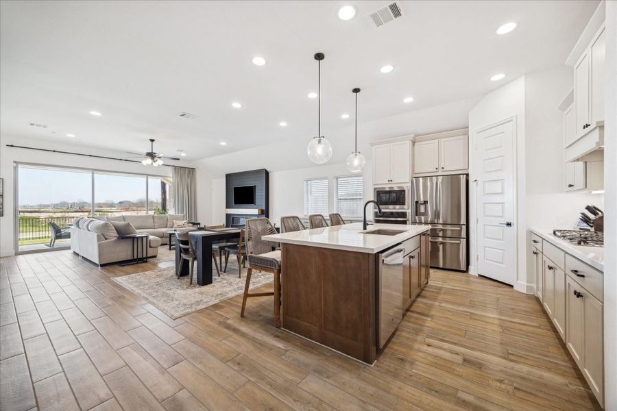 Accent island color to complement the off-white cabinetry.