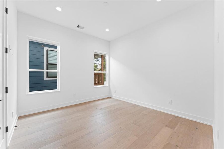 Secondary bedrooms provide ample space and natural light.