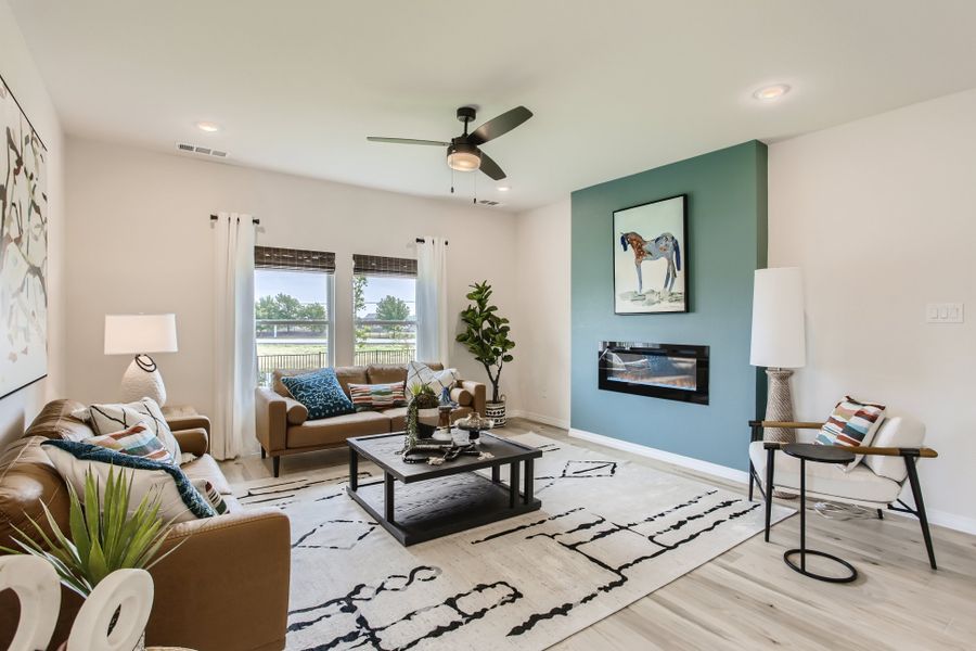 A living room with a fan.