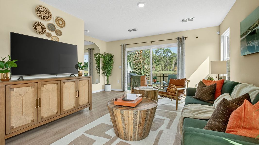 Representative furnished interior of a home built from the GREYSON II by D.R. Horton in Trout River, Jacksonville (Image 12).