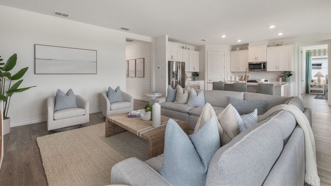 Representative furnished interior of a home built from the DENHAM by D.R. Horton in Lakes of Mount Dora, Mount Dora (Image 6).