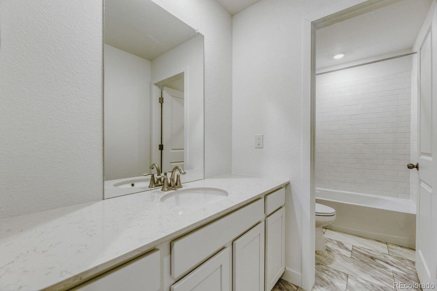 Furnished interior view inside a new home in Vermilion Creek, Centennial (Image 6).