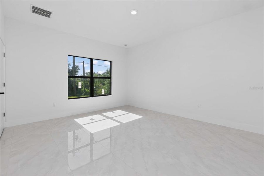 Spacious, unfurnished interior of a new home in , Port Charlotte (Image 44).