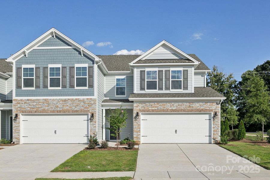 Front exterior of a new home in Blackstone Bay Townhomes, Sherrills Ford, NC, highlighting curb appeal (Image 15).