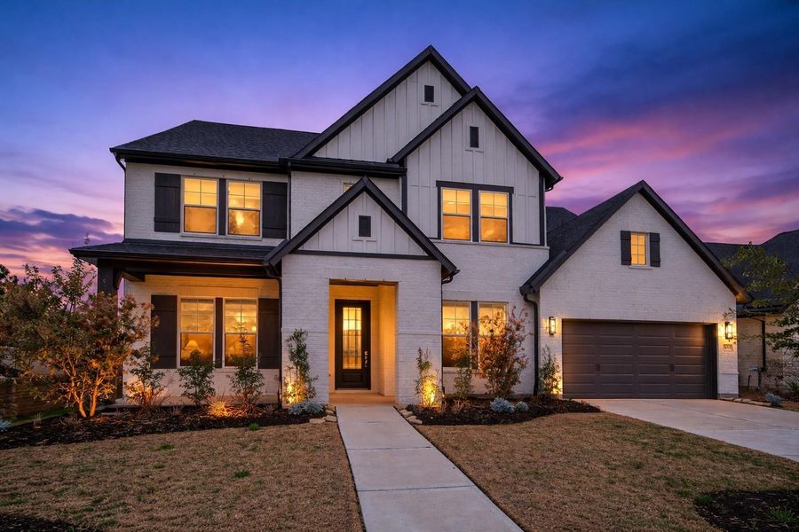 Front exterior of a new home in Dunham Pointe 65' Homesites, Cypress, TX, highlighting curb appeal (Image 1). Front exterior of a new home in Dunham Pointe 65' Homesites, Cypress, TX, highlighting curb appeal (Image 1).