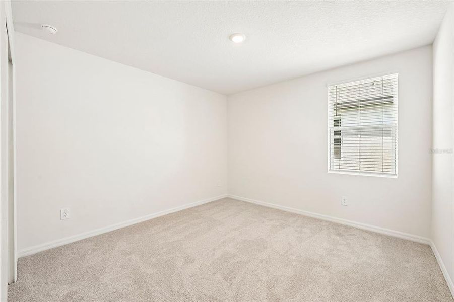 Spacious, unfurnished interior of a new home in Pine Ridge Meadows, Hudson (Image 58).