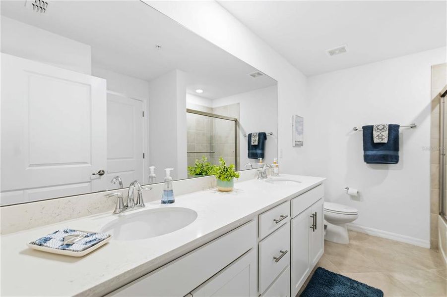 Furnished interior view inside a new home in Wellen Park Golf & Country Club, Venice (Image 23).