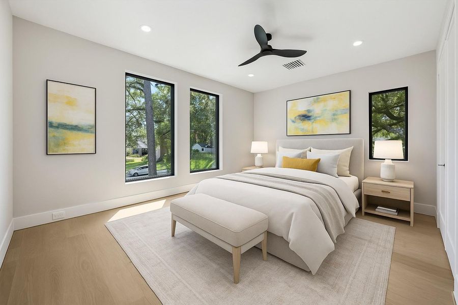 Virtually Staged. Another well-sized secondary bedroom features a walk-in closet with built-in shelving and plenty of storage. Designed for comfort, it’s an inviting space for guests or family members alike.