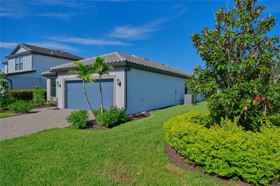 Front exterior of a new home in , Bradenton, FL, highlighting curb appeal (Image 28). Front exterior of a new home in , Bradenton, FL, highlighting curb appeal (Image 28).