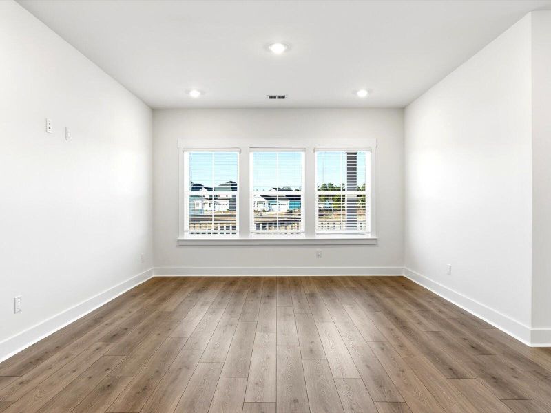 Spacious, unfurnished interior of a new home in The Coves at Lakes of Cane Bay, Summerville (Image 45). Spacious, unfurnished interior of a new home in The Coves at Lakes of Cane Bay, Summerville (Image 45).