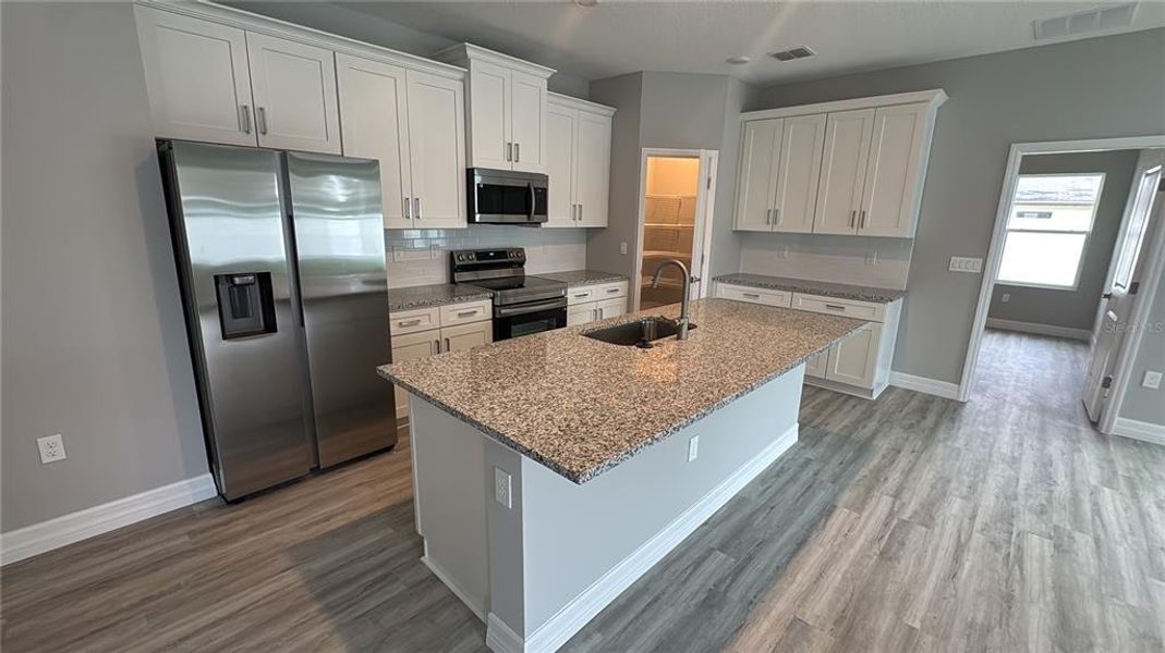 Furnished interior view inside a new home in , Summerfield (Image 6).