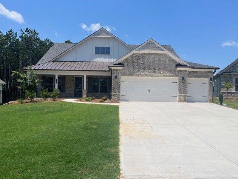 Front exterior of a new home in Soleil Belmont Park, Canton, GA, highlighting curb appeal (Image 1). Front exterior of a new home in Soleil Belmont Park, Canton, GA, highlighting curb appeal (Image 1).