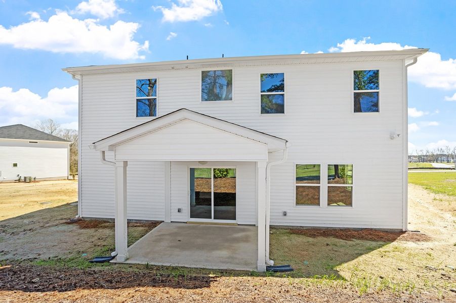 Exterior details and patio area of a home in Cambridge Reserve, Angier (Image 4).