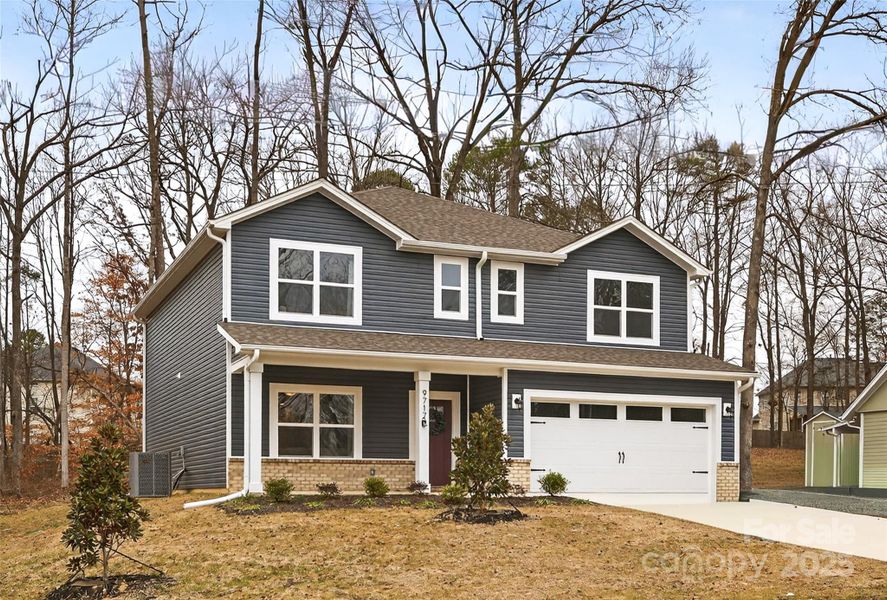 Front exterior of a new home in , Charlotte, NC, highlighting curb appeal (Image 25).