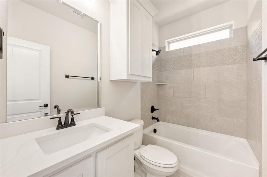 Furnished interior view inside a new home in Villages of Hurricane Creek, Anna (Image 15).