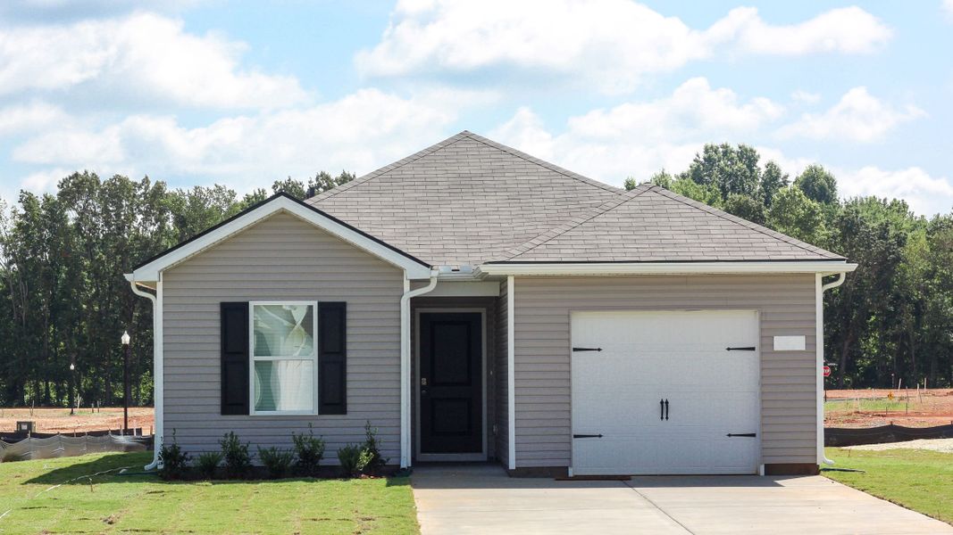 Representative exterior photo of a completed home built from the GREENBRIAR by D.R. Horton in Parkside Point, Portland, TN (Image 23).