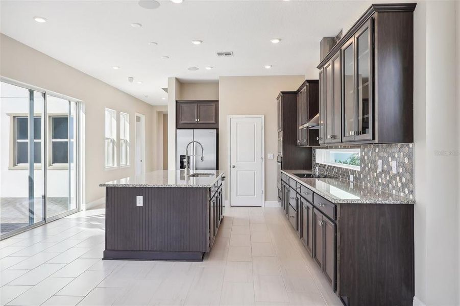 Furnished interior view inside a new home in Laureate Park, Orlando (Image 7).
